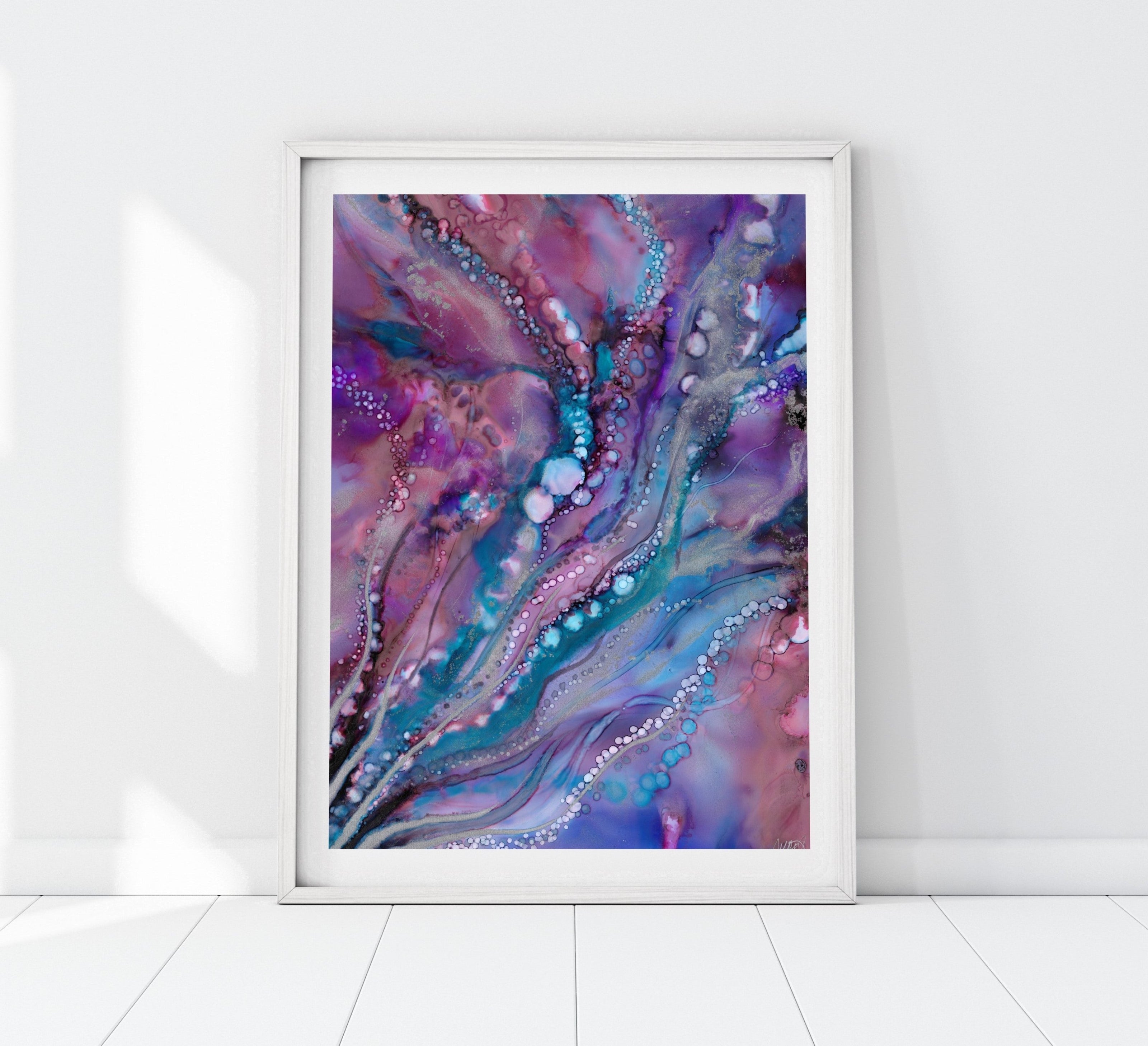 Vibrant nebula artwork with rich purples, blues, and cosmic sparkles, capturing the magic of deep space.