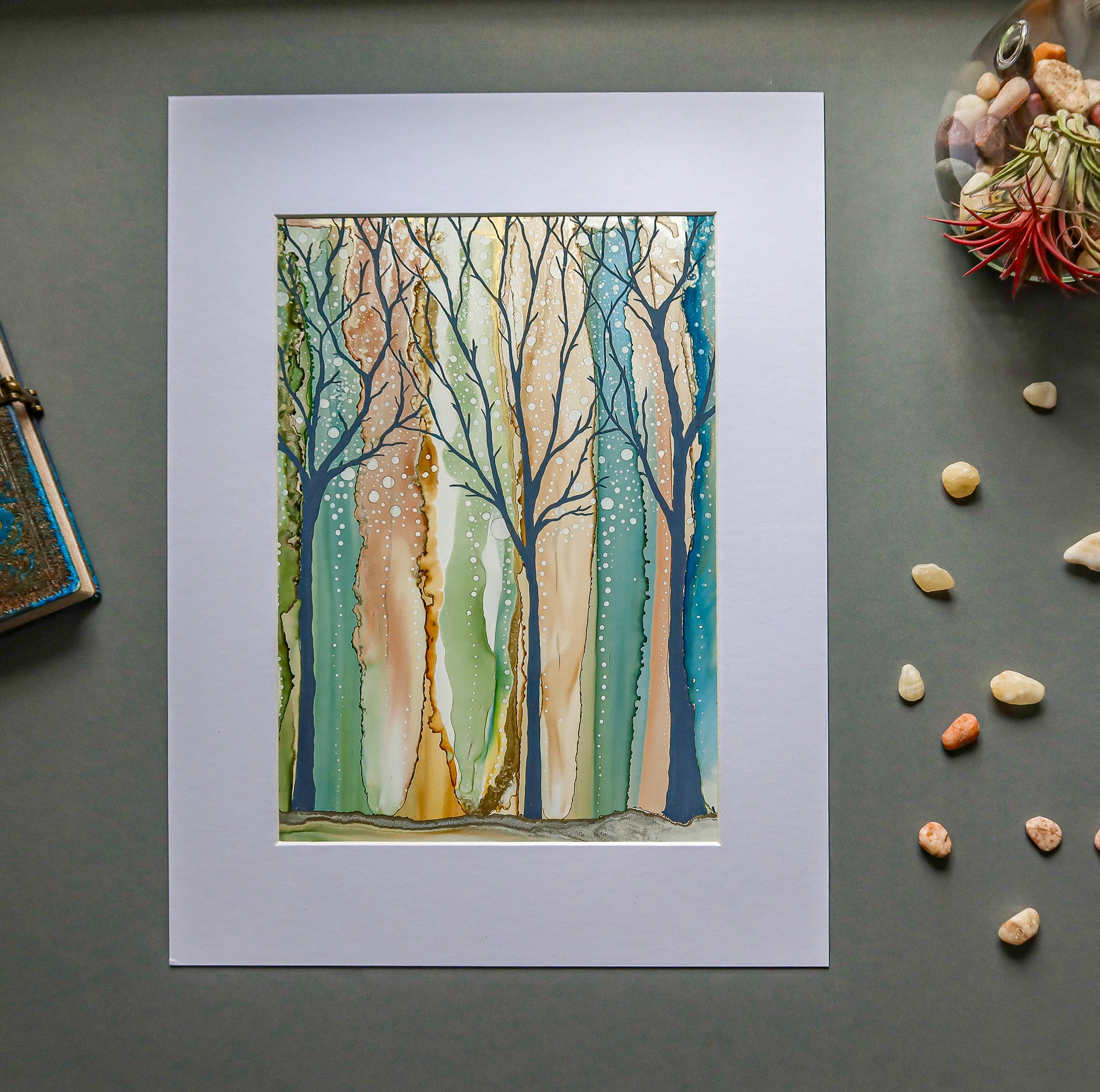 A mystical woodland painting with glowing tree silhouettes and a magical atmosphere